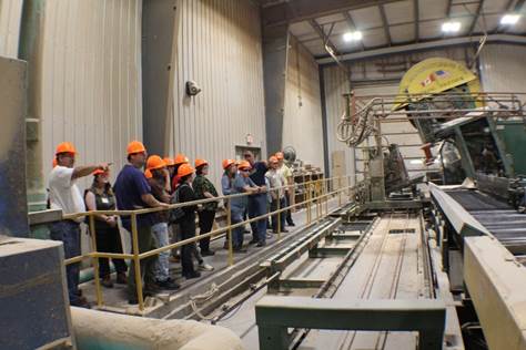 A group of people in a factory